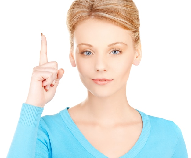 Bild einer attraktiven jungen Frau mit dem Finger nach oben