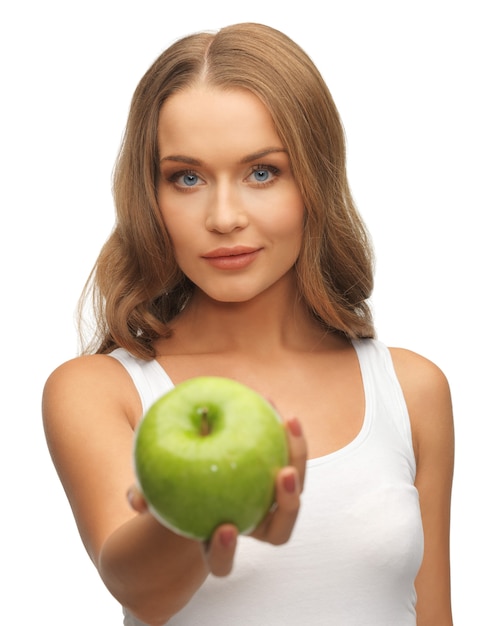 Bild einer schönen Frau mit grünem Apfel