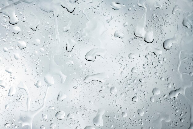 Bild Innenwasser Regentropfen auf Autofensterglas