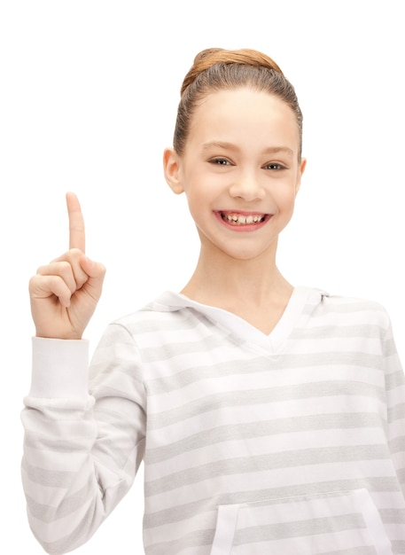 Bild von attraktivem Teenager-Mädchen mit dem Finger nach oben