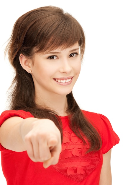 Bild von Teenager-Mädchen, das mit dem Finger zeigt