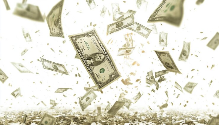 un billete de un dólar está en una pila de dinero