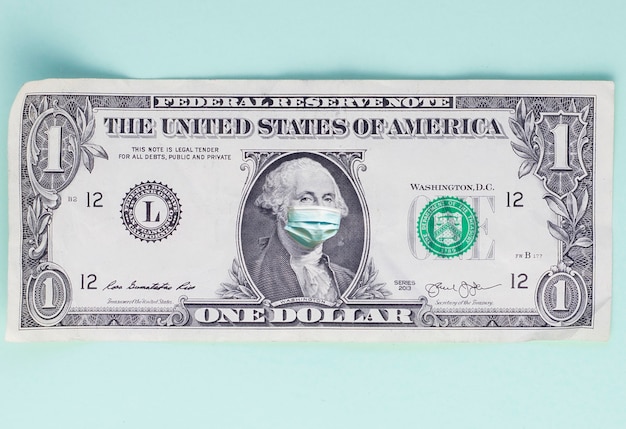Billete de un dólar con máscara médica