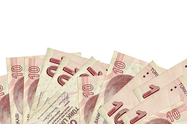 Billetes de 10 liras turcas se encuentra en la parte inferior de la pantalla de fondo aislado con espacio de copia.
