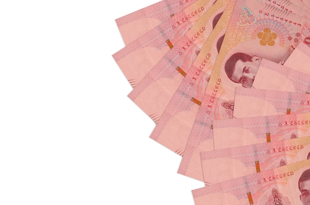 Billetes de baht tailandés se encuentra aislado sobre fondo blanco.