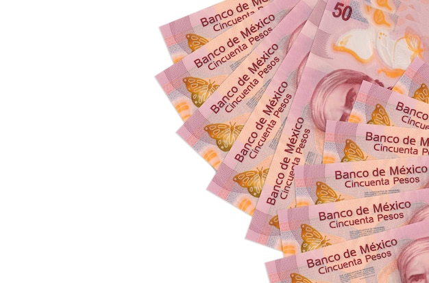 Billetes de pesos mexicanos en superficie blanca