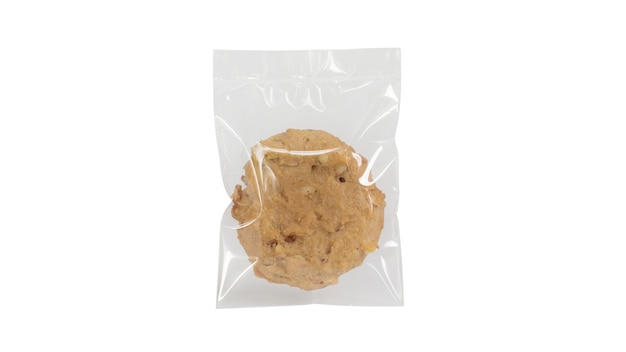 Foto biscoito caseiro em embalagem de saco plástico isolado no branco.