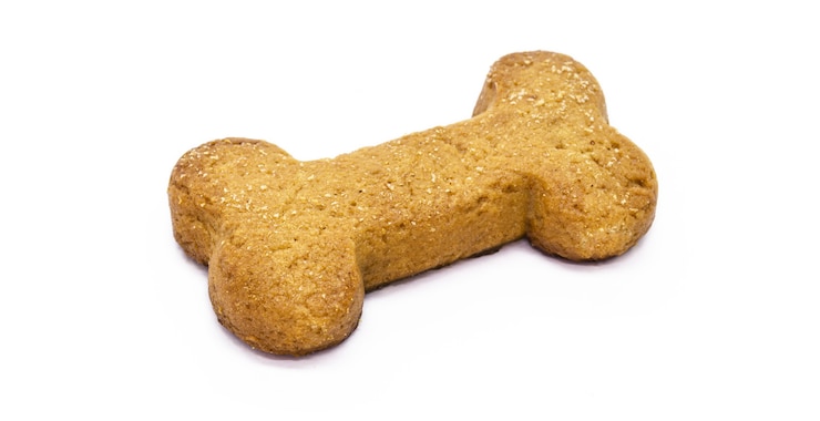 Foto biscoito caseiro em formato de osso, comida de cachorro saudável