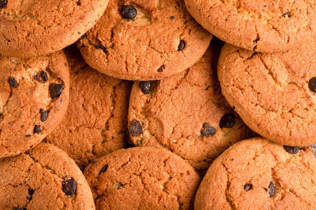 Biscoitos cookies em diferentes fundos biscoitos de aveia com chocolate