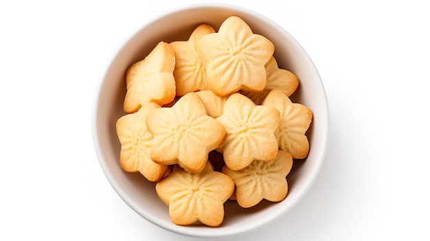 Biscoitos de açúcar em uma tigela isolada na vista superior do fundo branco