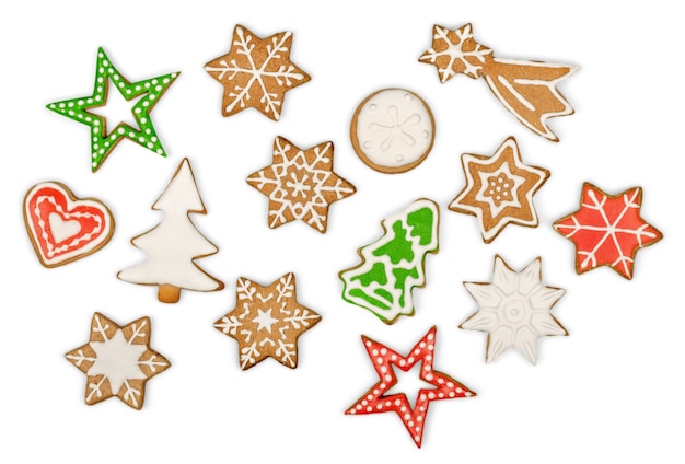 Biscoitos de gengibre em fundo branco. Formas de floco de neve, estrela, homem, anjo, doces