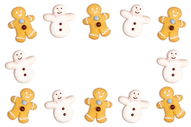 Biscoitos de Natal de boneco de neve e boneco de gengibre em branco