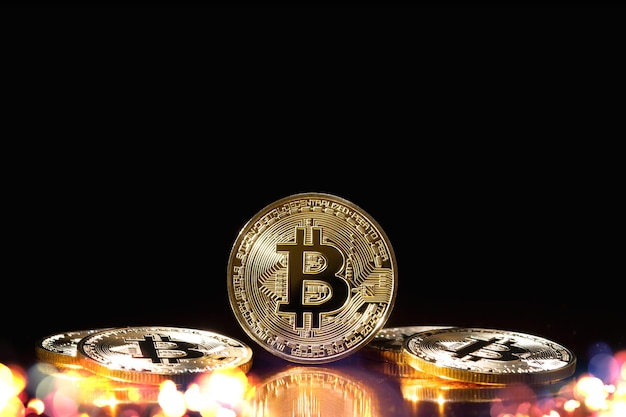 Foto bitcoin com bokeh borrado colorido em fundo preto