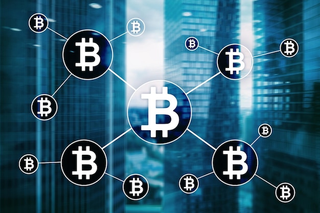 Bitcoin cryptocurrency y concepto de tecnología blockchain en el fondo de rascacielos borrosos
