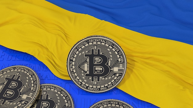 Bitcoin metálico sobre la bandera de Ucrania