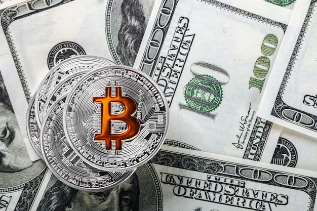 Bitcoin monedas en dólares de fondo