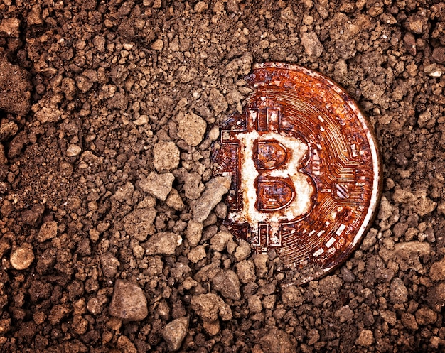 Bitcoin oxidado enterrado