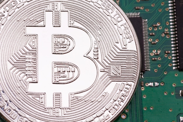 Bitcoin plata con fondo de tecnología de parte de computadora Bit coi