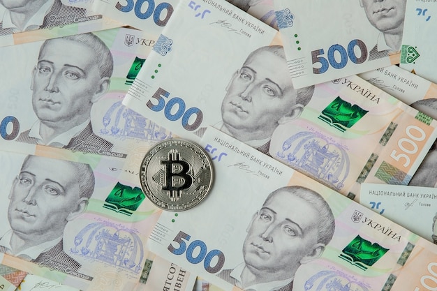 Bitcoin vor dem Hintergrund der ukrainischen Griwna.