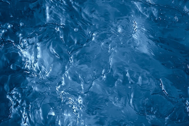 blaue Hintergrundtextur Wasseroberflächenströmung, abstrakte Wasseroberfläche