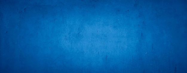 blauer abstrakter grungiger Beschaffenheitshintergrund des Wandzementbetons