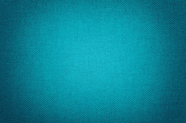 Blauer Hintergrund von einem Textilmaterial mit Weidenmuster, Nahaufnahme.