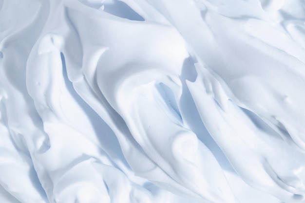 Blauer Mousse-Schaum, cremige Textur Schäumender Hautpflegeprodukt-Schmierfleck