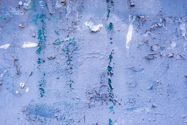 Blauer Wandhintergrund einer alten Mauer mit Putz