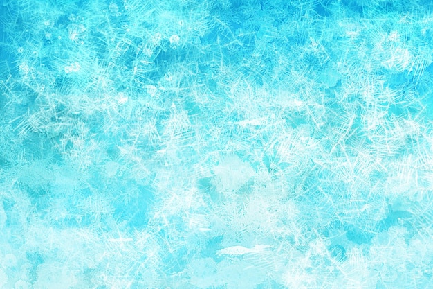 Blauer Winter-Hintergrund mit Frostverzierung