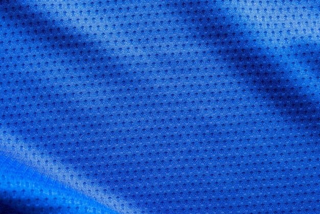 Blaues Stoff-Sportbekleidungs-Fußball-Trikot mit Air-Mesh-Textur-Hintergrund