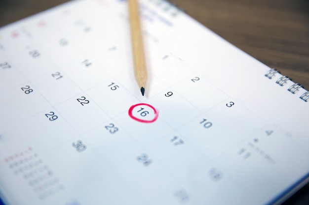 Bleistift auf Kalender, Konzepte für Veranstaltungsplaner für Geschäftstreffen