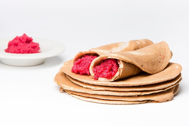 Blinis (crepes con caviar rojo típicos del carnaval ruso)