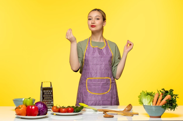 Blogger de comida joven cocinero fitness grabando video para redes sociales haciendo gesto italiano