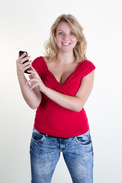 Foto blonde und reizvolle junge frau mit blauen augen