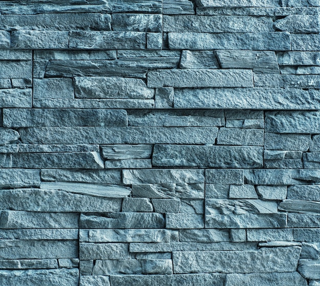 Los bloques de piedra maciza La pared de piedra gris Vintage rústico resistido fondo desigual