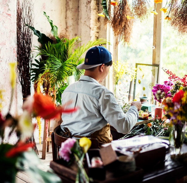 Blumenladengeschäftsinhaber-Arbeitsdienst