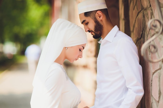 Foto boda nacional novia y novio boda pareja musulmana durante la ceremonia de matrimonio matrimonio musulmán