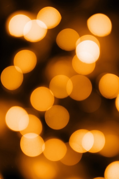 Bokeh abstracto navideño en tono amarillo