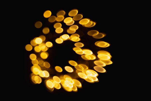 Foto bokeh abstrato brilhante cor de fundo amarelo com círculos de brilho