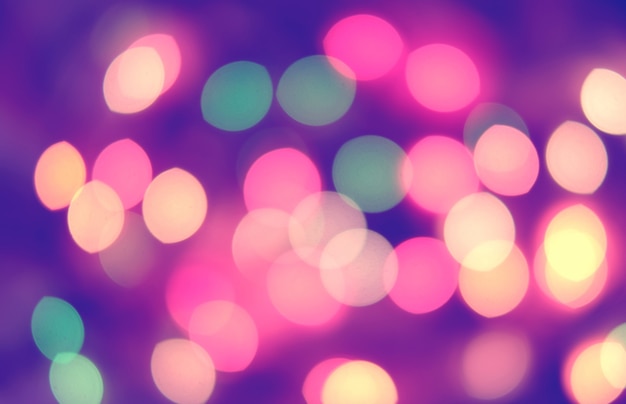 Bokeh abstrato de Natal em tom vintage roxo