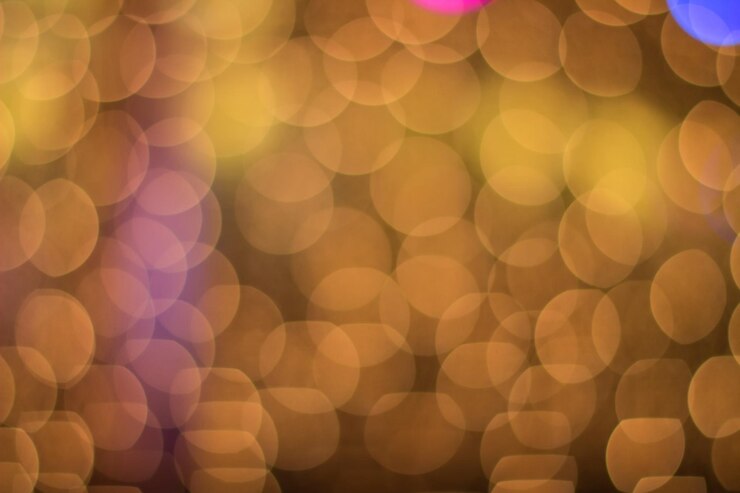 Foto bokeh de círculo dorado y amarillo abstracto