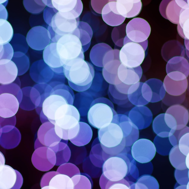 Bokeh de luz brilhante de natal em cores azuis