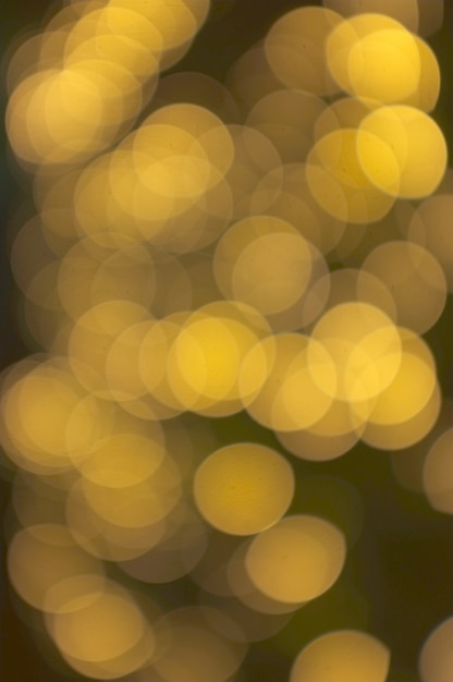 Bokeh dorado luz abstracta, fondo naranja