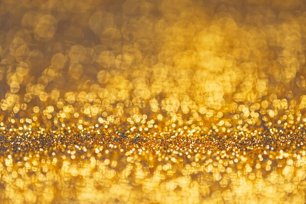 Bokeh dourado e elegante fundo abstrato