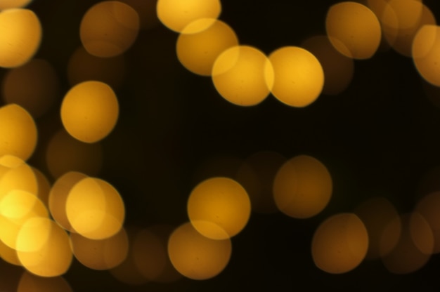 Bokeh dourado luz abstrata, fundo laranja