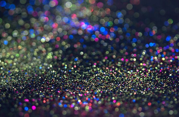 Bokeh glitter fly y luces en negro