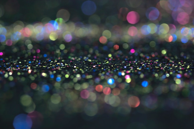 Bokeh glitter fly y luces en negro