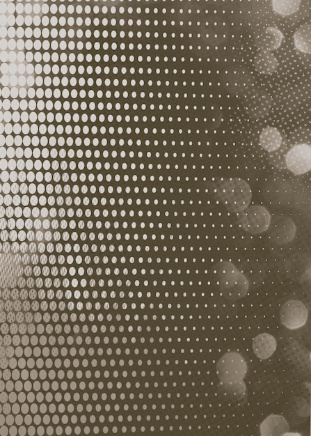 Foto bokeh gris con ilustración de fondo vertical de puntos