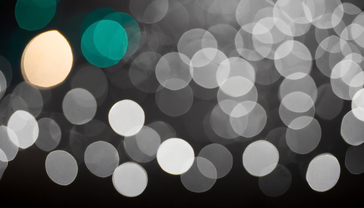 Foto bokeh de luces en fondo negro luces blancas negras bokeh fondo bokeh brillante bokeh aislado