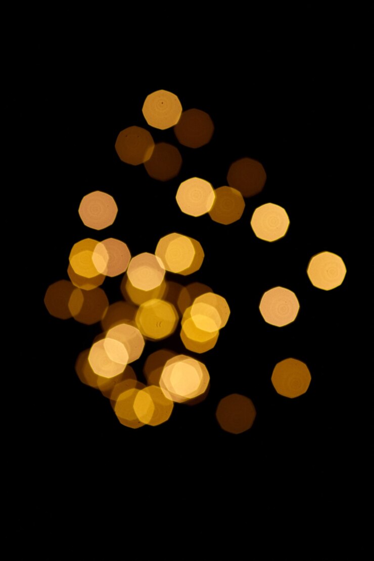Bokeh de luz borrosa sobre un fondo negro